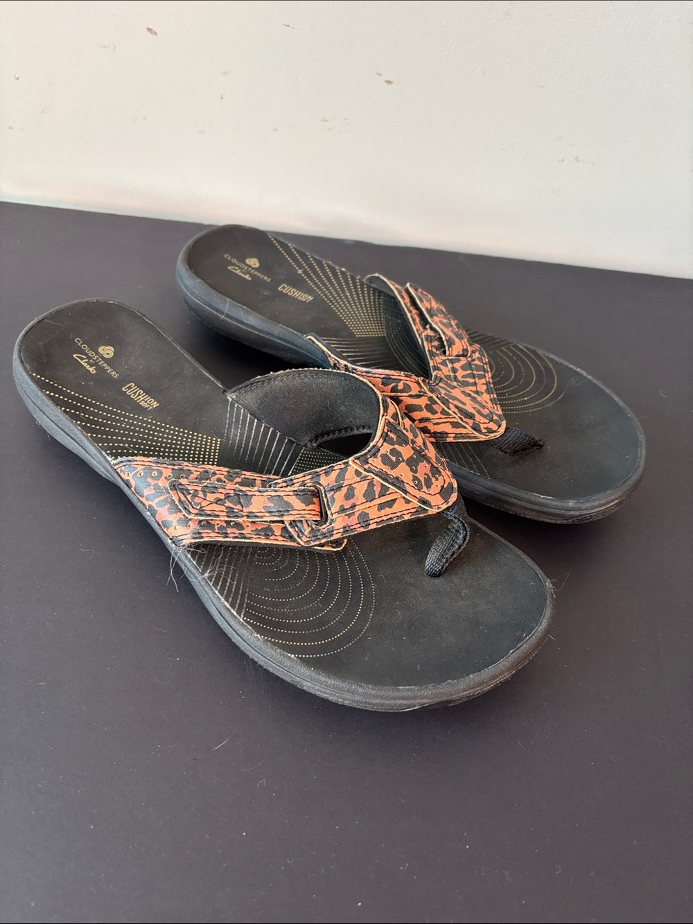Clarks Black Footbed Thong Sandals with Leopard-Pattern Straps